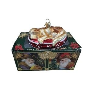 Old World Christmas Sleeping Dog on Bed Glass Ornament Holiday Tree Decoration